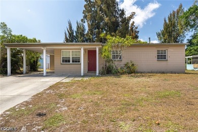 Welcome to this 4-bedroom, 2-bath home located in the Tropical - photo 1