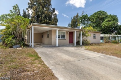 Welcome to this 4-bedroom, 2-bath home located in the Tropical - photo 2