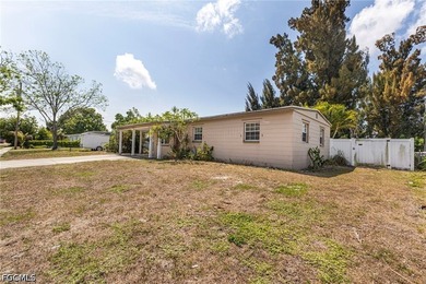 Welcome to this 4-bedroom, 2-bath home located in the Tropical - photo 4