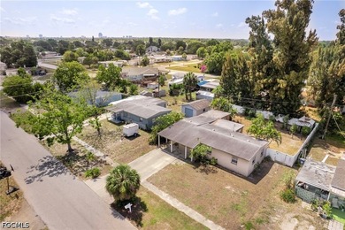 Welcome to this 4-bedroom, 2-bath home located in the Tropical - photo 6