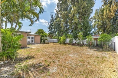 Welcome to this 4-bedroom, 2-bath home located in the Tropical - photo 10