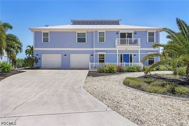Welcome to a rare direct Gulf access waterfront estate in the - photo 1