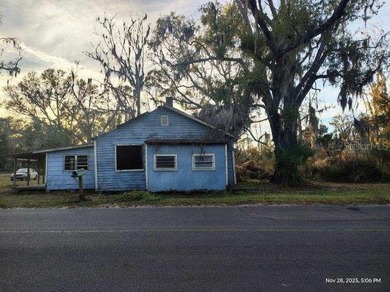 FIXER IN PERRY ON ALMOST 1 ACRE CORNER LOT! This property - photo 1