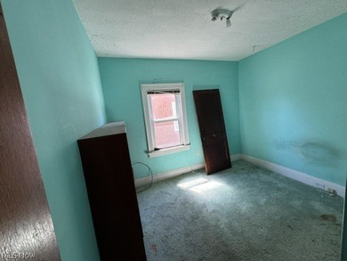 Investment Opportunity in this cape cod style home on the - photo 11