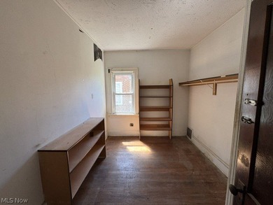 Investment Opportunity in this cape cod style home on the - photo 12