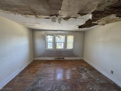 Investment Opportunity in this cape cod style home on the - photo 16