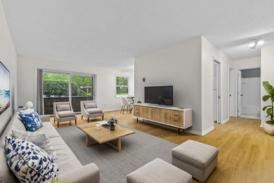 Welcome to easy living in this charming first-level 1-bedroom - photo 1