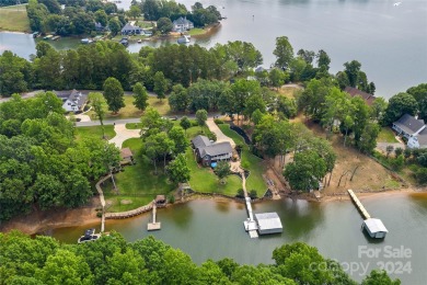 Immerse yourself in the laid-back luxury of this Lake Norman - Lake Home For Sale in Troutman, North Carolina