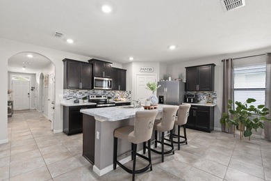Welcome to this stunning spacious Cali model home located in the - photo 8
