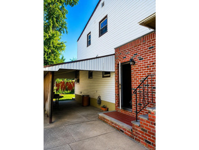 This well-maintained two-family home offers 4 spacious bedrooms - photo 2
