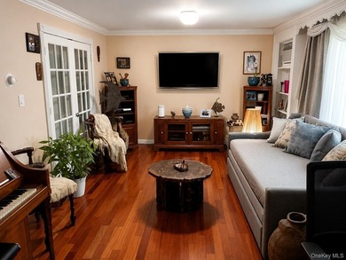This well-maintained two-family home offers 4 spacious bedrooms - photo 4