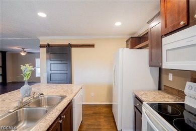 Take a tour to this 3-bedroom, 2-bathroom manufactured home - photo 8