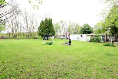 This charming, cozy mobile home sits on two spacious lots - photo 10