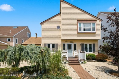 Enjoy waterfront living in this spacious 4-bedroom, 2-bath home - photo 1