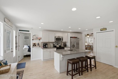 Enjoy waterfront living in this spacious 4-bedroom, 2-bath home - photo 5