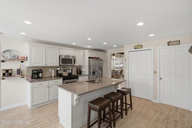 Enjoy waterfront living in this spacious 4-bedroom, 2-bath home - photo 6