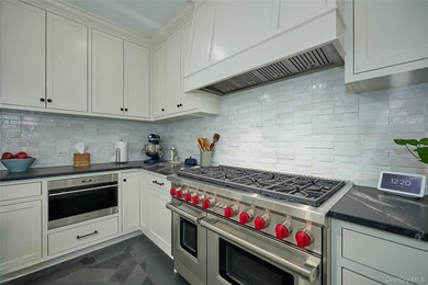 Comprehensively renovated in 2022, and new roof, gutters and - photo 14