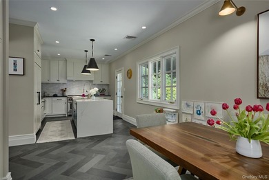 Comprehensively renovated in 2022, and new roof, gutters and - photo 15