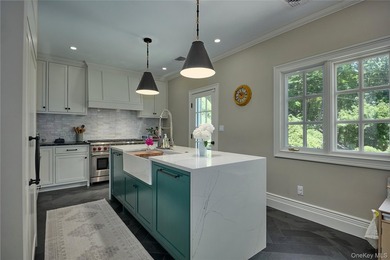 Comprehensively renovated in 2022, and new roof, gutters and - photo 16