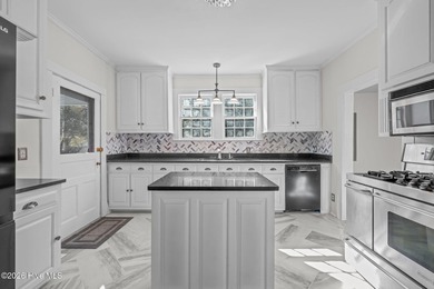 Renovated and offering the rare luxury of both first- and - photo 18