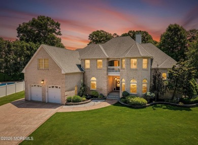 Offered for the first time, this custom-built home is nestled on - photo 1