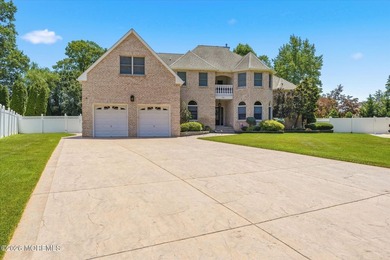 Offered for the first time, this custom-built home is nestled on - photo 3
