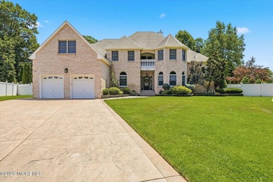 Offered for the first time, this custom-built home is nestled on - photo 4