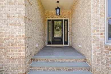 Offered for the first time, this custom-built home is nestled on - photo 9