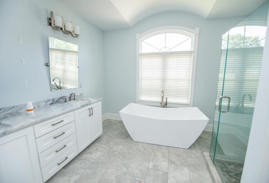 This waterfront home is special. Newer style home with formal - photo 11