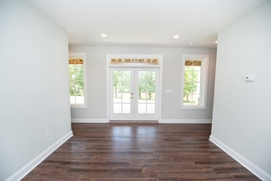 This waterfront home is special. Newer style home with formal - photo 12