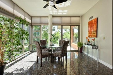 Modern Plaza-side condo with wraparound balcony and custom