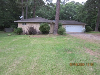 Well maintained brick home and 2 acres just outside city limits - photo 1
