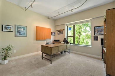 Modern Plaza-side condo with wraparound balcony and custom