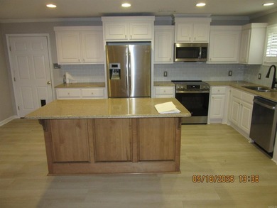 Well maintained brick home and 2 acres just outside city limits - photo 5