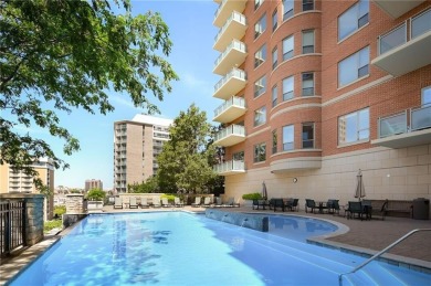 Modern Plaza-side condo with wraparound balcony and custom