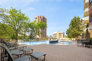 Modern Plaza-side condo with wraparound balcony and custom