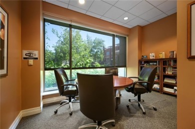 Modern Plaza-side condo with wraparound balcony and custom