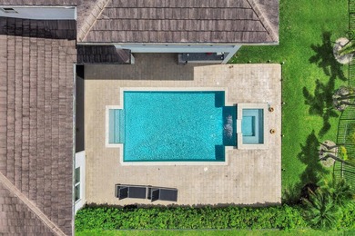 Discover elevated Florida living in this exceptional 5-bedroom - photo 12