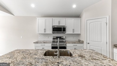 The Holly plan by Smith Family Homes is under construction in - photo 15
