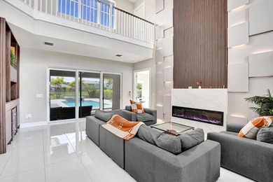 Discover elevated Florida living in this exceptional 5-bedroom - photo 16