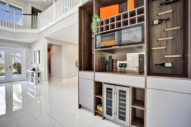 Discover elevated Florida living in this exceptional 5-bedroom - photo 18
