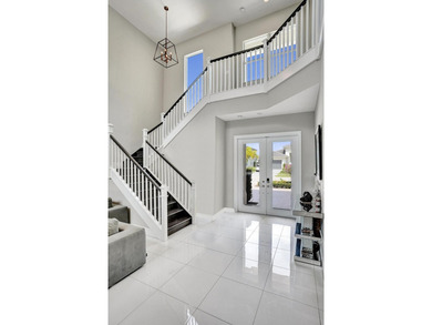Discover elevated Florida living in this exceptional 5-bedroom - photo 28