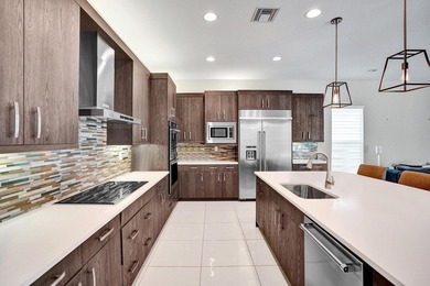 Discover elevated Florida living in this exceptional 5-bedroom - photo 29