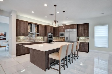 Discover elevated Florida living in this exceptional 5-bedroom - photo 30