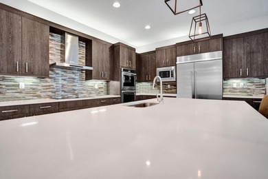 Discover elevated Florida living in this exceptional 5-bedroom - photo 34