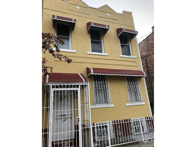 Fantastic opportunity to own a well-maintained three-family home - photo 1