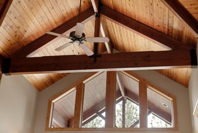 Located on the golf course, with mountain views, this NW lodge - photo 7
