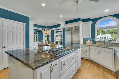 This exceptional Lowcountry home in Windmill Harbour offers an