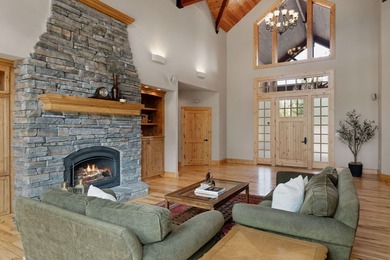 Located on the golf course, with mountain views, this NW lodge - photo 8