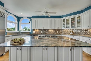 This exceptional Lowcountry home in Windmill Harbour offers an